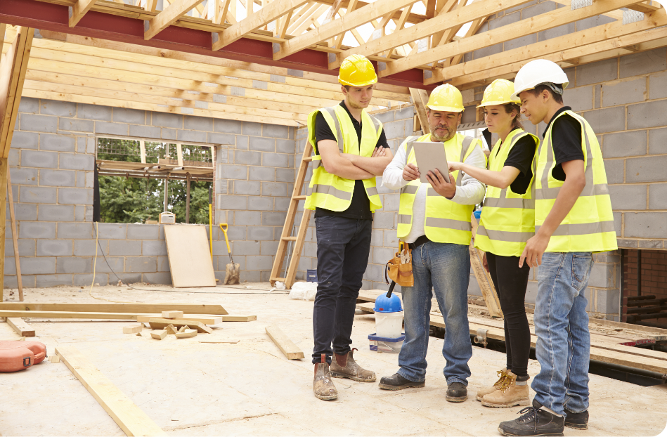 New Construction Home Warranty | Builders reviewing plans Under Home Warranty